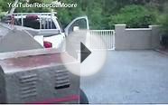 Inquisitive bear opens car doors